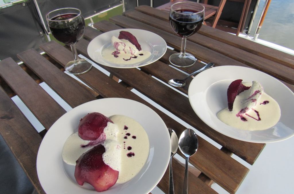 Poached pears in red wine with soy creme anglaise